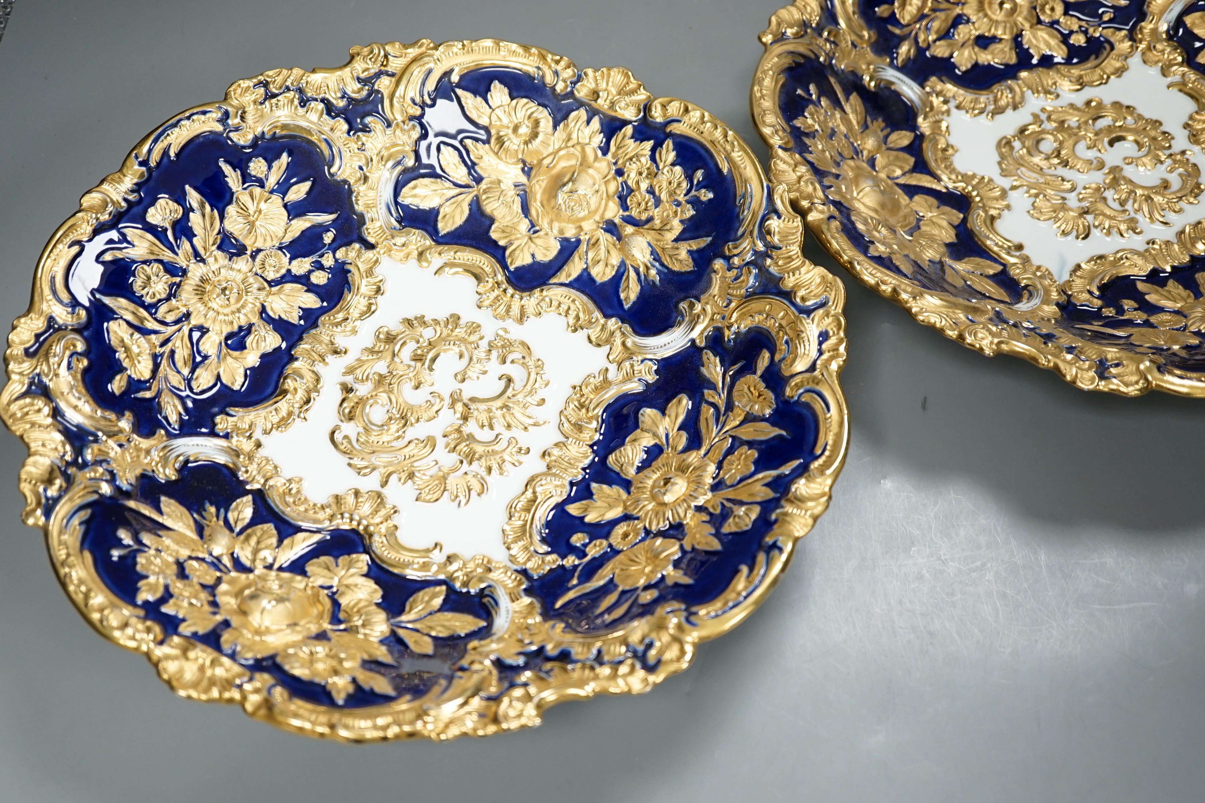 A pair of Meissen moulded wall plates, late 19th/early 20th century, 30.5cm diameter